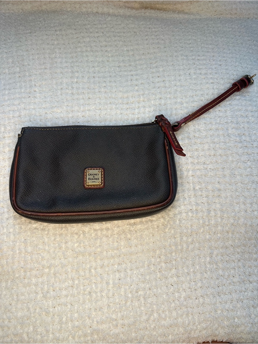 Dooney & Bourke Black Leather Wristlet with Brown Trim and Strap
